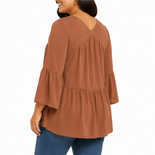 Blusa de corte amplio con escote en V y mangas acampanadas