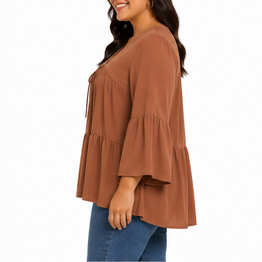 Blusa de corte amplio con escote en V y mangas acampanadas