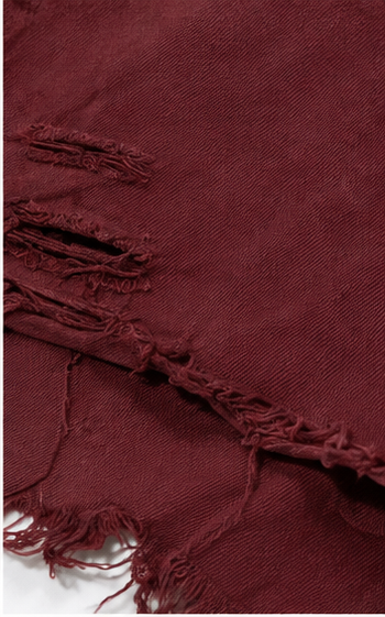 Short de mezclilla desgastado con botones al frente